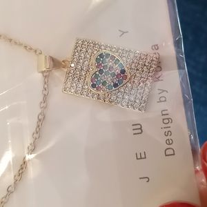 multi color goldtone heart necklace pave'